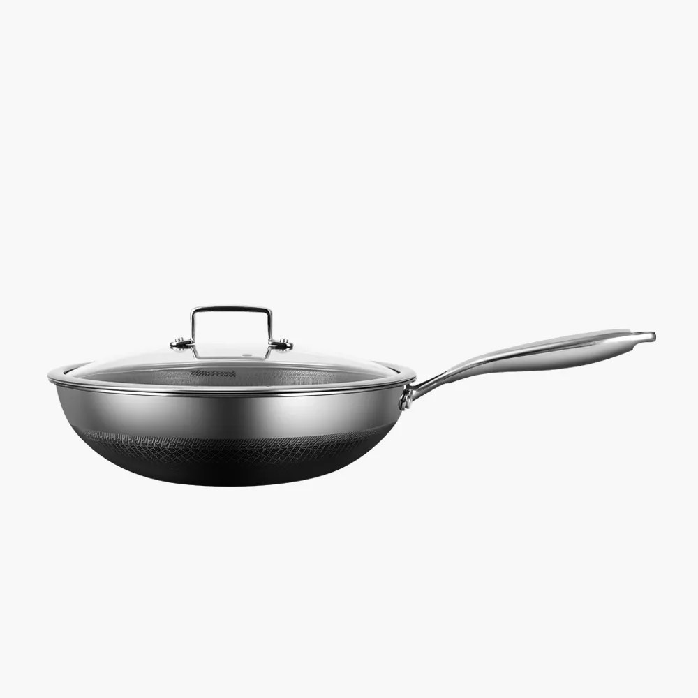Aristo Pro Wok Pan by Amercook. Coated with Tri-Ply stainless steel with hybrid non-stick interior and mirror polish exterior with non stick valley and scratch resistance peak and bottom fire resistance - 30CM