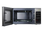 Door opened in the microwave and showing its wide door and sapcious interior
